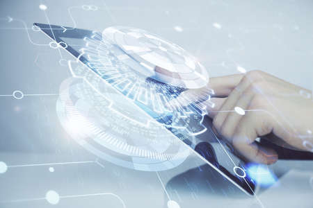 Multi exposure of man's hand holding and using a digital device and data theme drawing. Innovation...