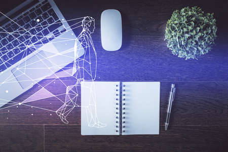 Start up theme drawing over computer on the desktop background. Top view. Double exposure. Brainstorm concept.の写真素材