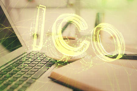 Double exposure of crypto technology drawing and desktop with coffee and items on table background....