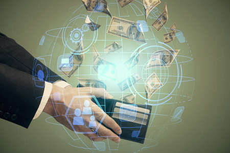 Multi exposure of social network theme drawing hologram and USA dollars bills and man hands.