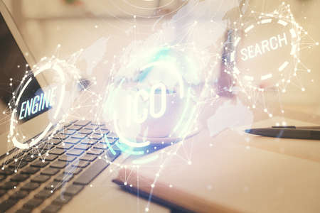 Double exposure of crypto technology drawing and desktop with coffee and items on table background....