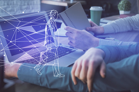 Double exposure of man and woman working together and creative hologram drawing. Start up concept. Computer background.の写真素材