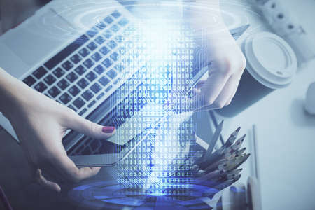 Multi exposure of woman hands working on computer and data theme hologram drawing. Tech concept.