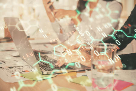 Double exposure of woman hands typing on computer and formula hologram drawing. Education concept.