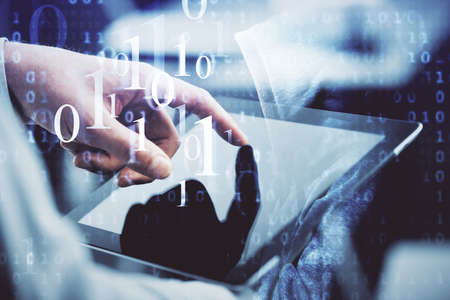Multi exposure of man's hand holding and using a digital device and data theme drawing. Innovation...