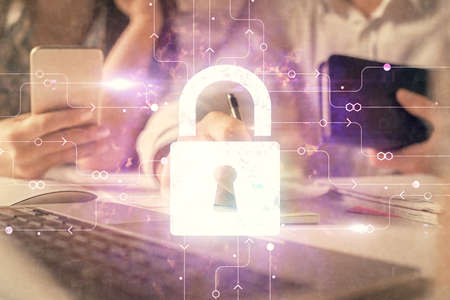 Double exposure of man and woman working together and technology theme lock drawing hologram....