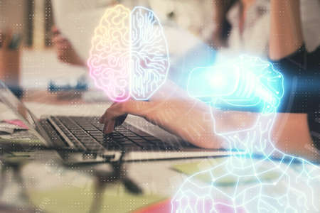 Double exposure of woman hands typing on computer and man in AR glasses drawing. Education concept.
