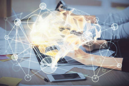 Multi exposure of woman hands working on computer and brain hologram drawing. Ai concept.の写真素材