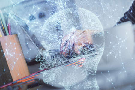Double exposure of woman hands working on computer and brain hologram drawing. Ai concept.