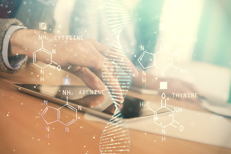 Double exposure of DNA drawing and man and woman working together holding and using a mobile device. Medical education concept.の写真素材