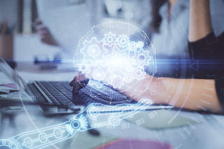 Multi exposure of woman hands working on computer and data theme hologram drawing. Tech concept.