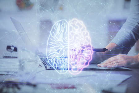 Multi exposure of woman hands working on computer and brain hologram drawing. Ai concept.の写真素材