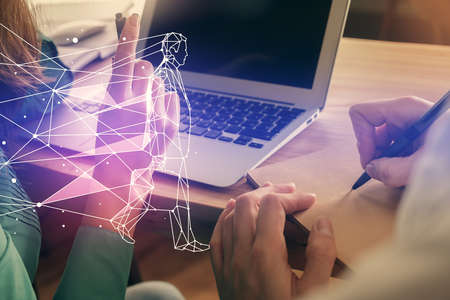 Double exposure of man and woman working together and creative hologram drawing. Start up concept....