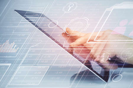 Multi exposure of man's hand holding and using a digital device and data theme drawing. Innovation...