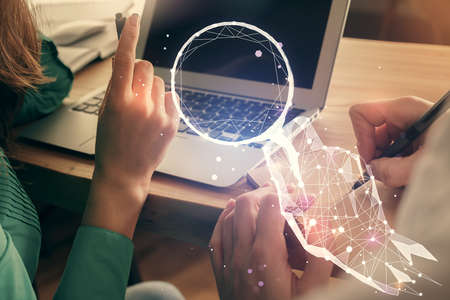 Double exposure of man and woman working together and creative hologram drawing. Start up concept....