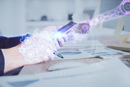 Multi exposure of man's hands holding and using a digital device and data theme drawing. Innovation concept.の写真素材