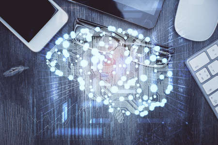 Double exposure of brain drawing over work table desktop. Top view. Global data analysis concept.