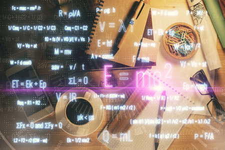 Double exposure of tech formula drawing and work table top veiw. concept of education.の写真素材