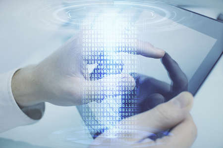 Multi exposure of man's hand holding and using a digital device and data theme drawing. Innovation...