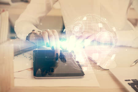 Double exposure of social network sketch hologram and woman holding and using a mobile device.