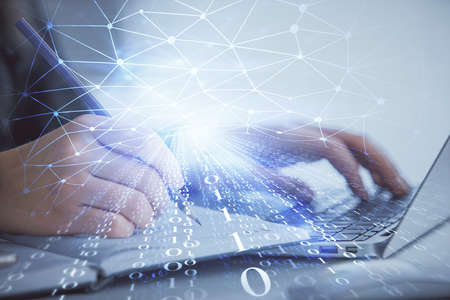 Multi exposure of woman hands working on computer and data theme hologram drawing. Tech concept.