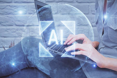 Double exposure of woman hands working on computer and data theme hologram drawing. Tech concept.