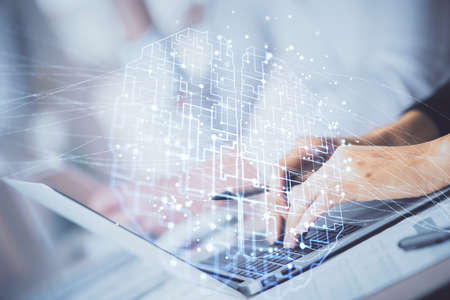 Double exposure of woman hands working on computer and brain hologram drawing. Ai concept.の写真素材