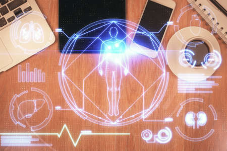 Double exposure of education theme drawing over table with phone. Top view. Science education concept.の写真素材