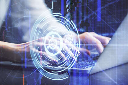 Multi exposure of woman hands working on computer and data theme hologram drawing. Tech concept.