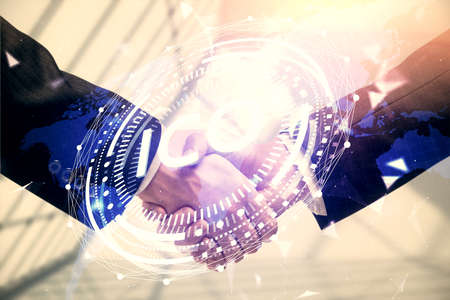 Double exposure of blockchain hologram and handshake of two men. Crypto business concept.
