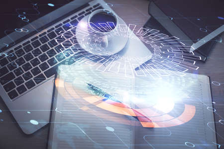 Multi exposure of data theme drawing hologram over topview work desk background with computer....