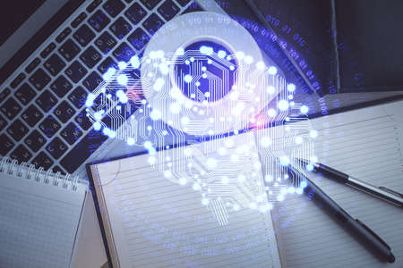 Double exposure of brain drawing hologram over topview work table background with computer. Concept...