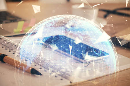 Double exposure of financial graph drawing and cell phone background. Concept of forex tradingの写真素材