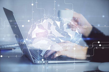 Multi exposure of woman hands working on computer and human brain hologram drawing. Ai tech concept.
