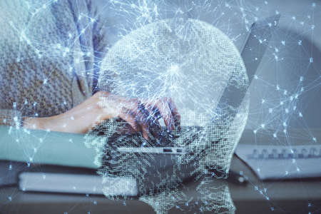 Multi exposure of woman hands working on computer and brain hologram drawing. Ai concept.