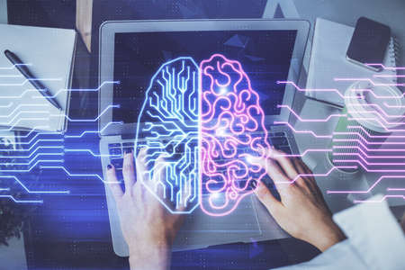 Double exposure of woman hands working on computer and brain hologram drawing. Ai concept.