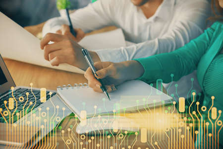 Double exposure of data theme sketch drawing over people writing background. Concept of technologyの写真素材