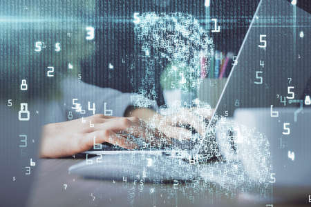 Double exposure of woman hands working on computer and data theme hologram drawing. Tech concept.