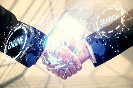 Double exposure of blockchain hologram and handshake of two men. Crypto business concept.