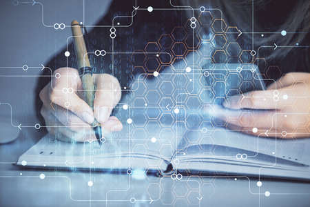 Multi exposure of woman hands working on computer and data theme hologram drawing. Tech concept.