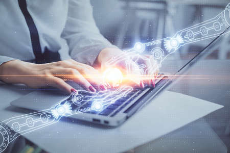 Multi exposure of woman hands working on computer and data theme hologram drawing. Tech concept.