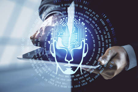 Double exposure of man's hand holding and using a digital device and brain hologram drawing. Data...