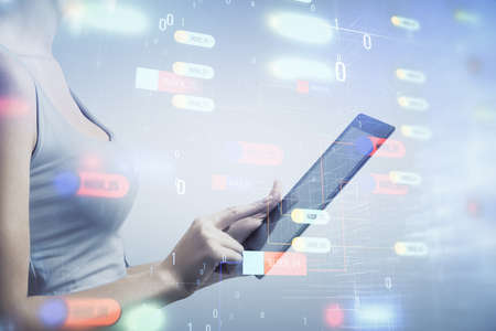 Double exposure of technology sketch hologram and woman holding and using a mobile device.