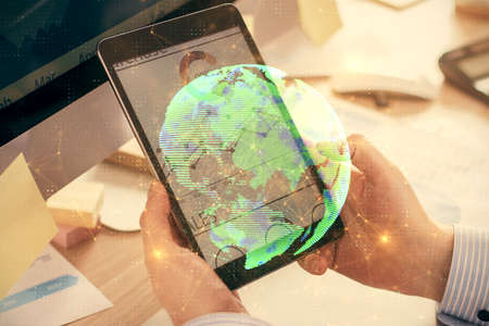 Double exposure of man's hands holding and using a phone and social network theme drawing.