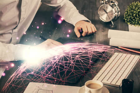 Double exposure of man's hands holding and using a phone and social network theme drawing.