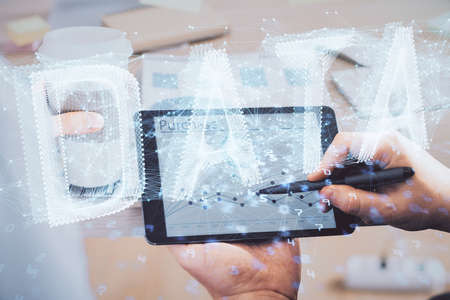 Multi exposure of man's hands holding and using a digital device and data theme drawing. innovation concept.の写真素材