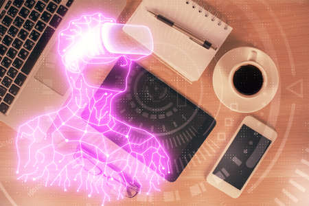 Double exposure of drawing man in AR glasses over table with phone. top view. VR concept.