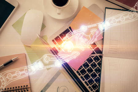 Double exposure of data hologram sketch over study table background with computer. Concept of Ai....