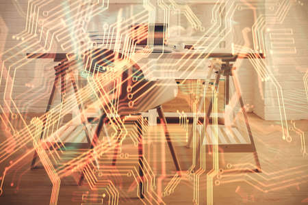 Double exposure of tech theme drawings and office interior background. Technology concept.