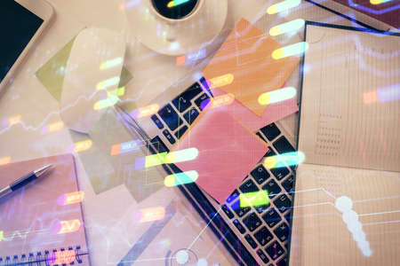 Double exposure of data hologram sketch over study table background with computer. Concept of Ai. Top view.の写真素材